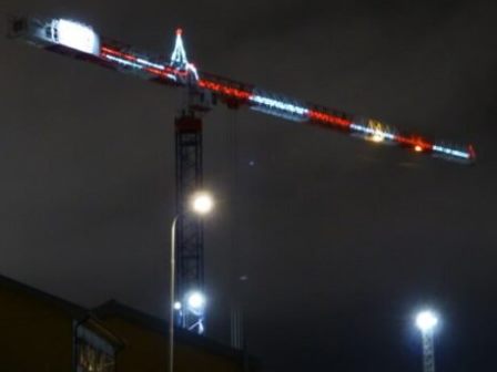 Why do cranes have red lights?
